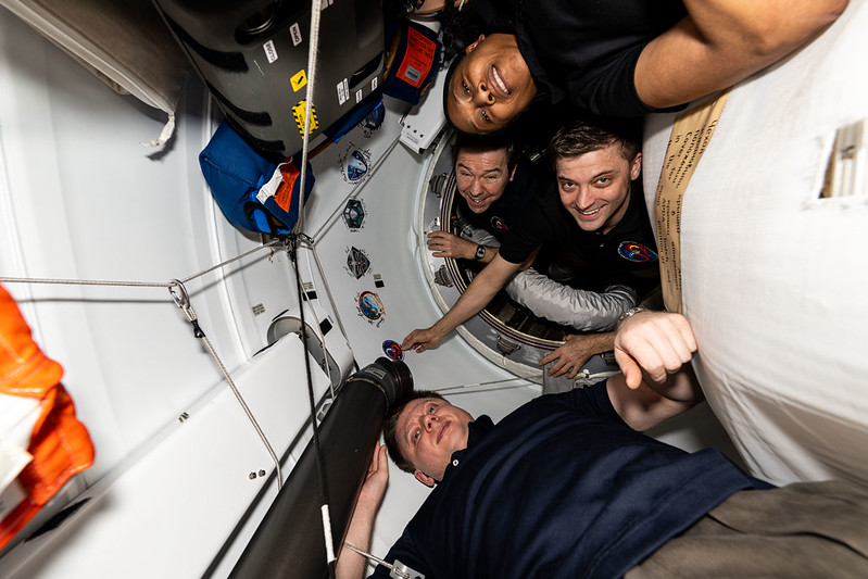 Shown onboard the International Space Station are (top to bottom) NASA astronauts Jeanette Epps, Mike Barratt, and Matthew Dominick, and Roscosmos cosmonaut Alexander Grebenkin.